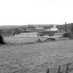General view from NNE showing ENE and NNW fronts of distillery buildings
