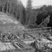 Erection of bailey bridge.