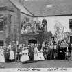 The wedding of Elena Cecilia Anne Kinloch, daughter of Sir George Kinloch, and George Palmer, civil engineer outside Meigle House, Perthshire. 
Titled: "Meigle House Sept 8th 1886".