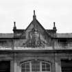 View of carved crest on south west facade of Maryhill Public Baths and Wash House.