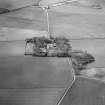 Oblique aerial view centred on Muchalls Castle, looking to the W.