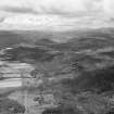 General oblique aerial view centred on Tullich, the Pass of Ballater and the River Dee, looking to the WSW.