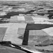 Oblique aerial view centred on the cropmarks of the Roman Temporary Camp at Normandykes, looking to the N.