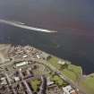 Oblique aerial view of Port Glasgow taken from the South, showing the tolbooth and the quay. The Waverley Steamer is also shown.  