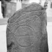 Detail of face of Kintore Pictish symbol stone no 1 showing salmon and triple disc symbol.