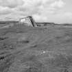 Tain Airfield tracked target range. View from SE showing N wall protecting building for tracked target vehicle.