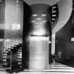 Interior view of the lift and spiral stair in the entrance hall of Scottish Widows, St Andrew Square, Edinburgh.
