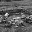 Excavation photographs: kiln house excavation in Area 7.