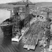 Photograph of W Yard, showing Tower Crane 'B' being erected on 645 ft crane track and site of Tower Crane D bottom right hand corner, John Brown and Co Ltd Engineers and Shipbuilders, Clydebank.
