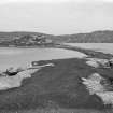 General view of broch from the West looking along the causeway.