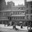 General view of High Street between Canongate and North Bridge, Edinburgh showing no 153 Allan Ramsay's House, The Temperance Hotel, no 143 The Gun'Temperance and The Gun Coffee House.