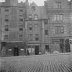 View of 74-84 (even) Grassmarket before restoration of 1929-1930 flanked by Nos 72 and 86