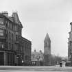EPS/40/4  Photograph with text: 'Hope Park Terrace - looking West from Clerk Street, showing Hope Park and Buccleuch Congregational Church; Hope Park United Free Church and entrance to Melville Drive'.
Edinburgh Photographic Society Survey of Edinburgh and District, Ward XIV George Square
