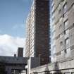 Dundee, Maxwelltown CDA, Alexander St: Side view of four 23-storey blocks and garages.