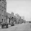 View of Main Street, Newhaven, Edinburgh. 
Titled: 'Newhaven, Main Street'.
