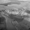 Oblique aerial view centred on Stanley Mills and village .