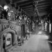 Interior.
View of Entrance Hall showing armoury and fireplace