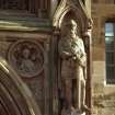 View of statue of Robert I, King of Scots, in right lower niche of main entrance, N facade.