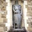 Close-up view of statue of William Wallace, in niche on N side of entrance to Castle.