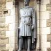 Close-up view of statue of Robert the Bruce, in niche on S side of entrance to Edinburgh Castle.