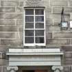 View of The Lodge of Edinburgh (Mary's Chapel) No.1, showing carved masonic symbol, lamp and bracket.