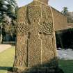 Pictish cross slab in Glamis manse garden, view of west (front) face (sunlight)