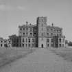 View of South front of central block of Gordon Castle during demolition work