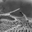 Kirkcaldy, general view, showing Harbour and High Street.  Oblique aerial photograph taken facing south-east.  This image has been produced from a damaged negative.