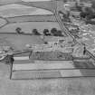 Ecclefechan, general view, showing Hoddam Road and Johnstone United Presbyterian Church.  Oblique aerial photograph taken facing north-west.