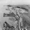 Tilbury Contracting and Dredging Co. Ltd. Quarry and Thomas Ward and Sons Shipbreaking Yard, Inverkeithing.  Oblique aerial photograph taken facing east.