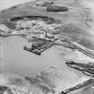 Tilbury Contracting and Dredging Co. Ltd. Quarry and Thomas Ward and Sons Shipbreaking Yard, Inverkeithing.  Oblique aerial photograph taken facing south.