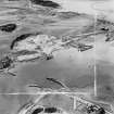 Tilbury Contracting and Dredging Co. Ltd. Quarry and Thomas Ward and Sons Shipbreaking Yard, Inverkeithing.  Oblique aerial photograph taken facing south-west.  This image has been produced from a crop marked negative.