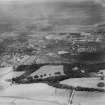 Airdrie, general view, showing Cairnhill House and Stewart and Lloyds Ltd. Imperial Steel Tube Works.  Oblique aerial photograph taken facing north.