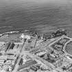 Fraserburgh, general view, showing Kinnaird Head Lighthouse and Bath Street.  Oblique aerial photograph taken facing north-east.