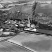 Carrongrove Paper Mills, Dunipace.  Oblique aerial photograph taken facing north.