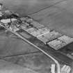 Glenlivet Distillery, Ballindalloch.  Oblique aerial photograph taken facing west.