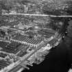 Glasgow, general view, showing Harland and Wolff Diesel Engine Works, 181 Lancefield Street and Anderston Quay.  Oblique aerial photograph taken facing east.  This image has been produced from a crop marked negative.