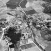 Braemar, general view, showing Clunie Water and Mar Road.  Oblique aerial photograph taken facing north-east.