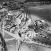 Aboyne, general view, showing Huntly Arms Hotel, Charlestown Road and Aboyne Station.  Oblique aerial photograph taken facing east.  This image has been produced from a crop marked negative.