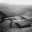 Cranshaws Castle and grounds.  Oblique aerial photograph taken facing south-west.  This image has been produced from a crop marked negative.