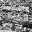 William Younger and Co. Ltd. Canonmills Maltings and Cooperage, Glenogle Road and Edinburgh Academy, Henderson Row, Edinburgh.  Oblique aerial photograph taken facing south.  This image has been produced from a crop marked negative.