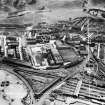 Edinburgh, general view, showing William Younger and Co. Ltd. Moray Park Maltings and St Margaret's Loch, Holyrood Park.  Oblique aerial photograph taken facing south.  This image has been produced from a crop marked negative.