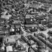 Greenock, general view, showing John Hastie and Co. Ltd. Kilblain Street Engine Works and St George's North Church, George Square.  Oblique aerial photograph taken facing south.  This image has been produced from a crop marked negative.