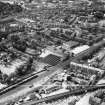 Paisley, general view, showing Scottish Wool Growers Ltd. Underwood Wool Stores, Brown Street and John Neilson Institution, Oakshaw Road.  Oblique aerial photograph taken facing south-west.  This image has been produced from a crop marked negative.