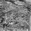 Kirkcaldy, general view, showing Bennochy Cemetery and High Street.  Oblique aerial photograph taken facing north.