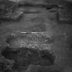 Cairnpapple Hill, photograph of excavation showing stone-holes 6 and 7, Beaker grave and Inhumation graves 1-4.