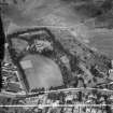 St Leonard's Hall, Holyrood Park Road and Salisbury Green, Dalkeith Road, Edinburgh.  Oblique aerial photograph taken facing north-east.  This image has been produced from a damaged and crop marked negative.