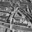 Edinburgh, general view, showing Waddie and Co. Ltd. St Stephen's Works, Slateford Road and Stewart Terrace.  Oblique aerial photograph taken facing north-east.  This image has been produced from a crop marked negative.