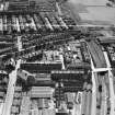 Edinburgh, general view, showing Waddie and Co. Ltd. St Stephen's Works, Slateford Road and Briarbank Terrace.  Oblique aerial photograph taken facing south-east.  This image has been produced from a crop marked negative.