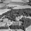 Affleck Castle and Home Farm, Monikie.  Oblique aerial photograph taken facing east.